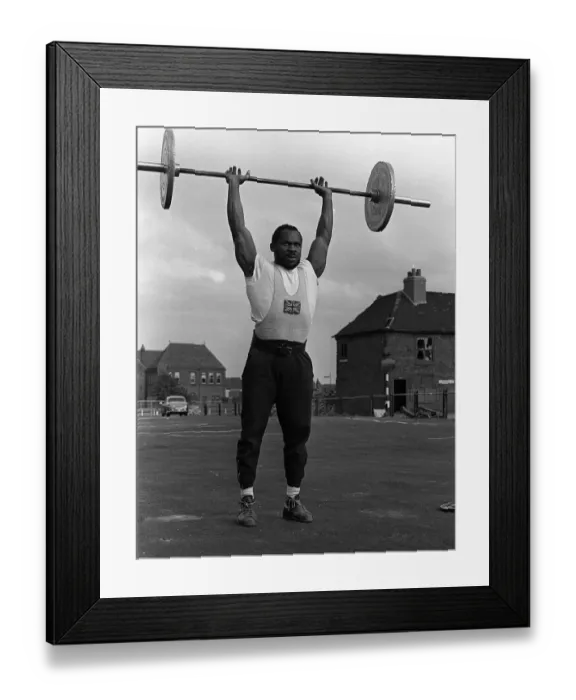 Framed Print : Weightlifter Louis Martin training in Rawdon Street where he lives in Derby Framed Print : Weightlifter Louis Martin training in Rawdon Street where he lives in Derby