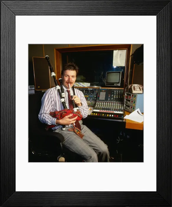 Framed Print : Richard Park DJ Disc Jockey Radio Clyde November 1987 Playing the bagpipes