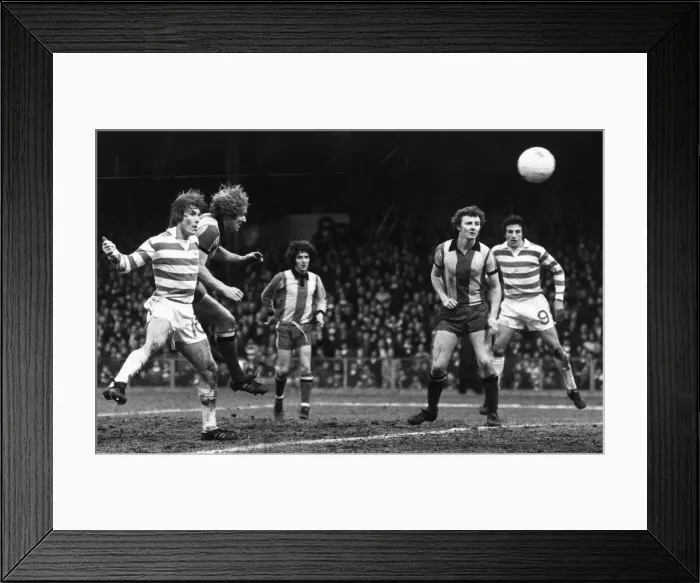 Framed Print : Kenny Dalglish Celtic heads for second goal beating Jackie Campbell Partick onlookers Framed Print : Kenny Dalglish Celtic heads for second goal beating Jackie Campbell Partick onlookers