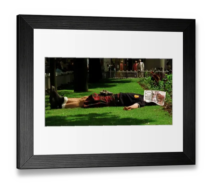 Framed Print : World Cup France June 1998 Scotland fan asleep lying in St Etienne garden with Daily