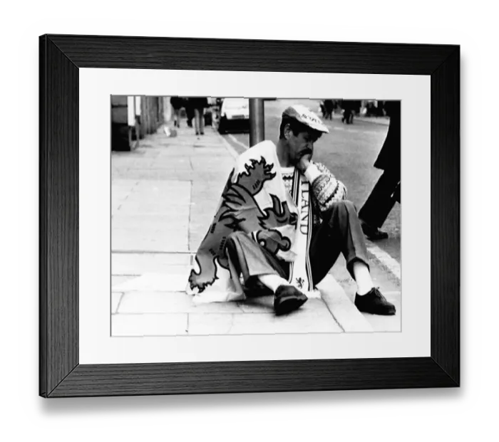 Framed Print : Scots football fan Italia 1990 World Cup dejected Scotland fan sits on pavement Framed Print : Scots football fan Italia 1990 World Cup dejected Scotland fan sits on pavement