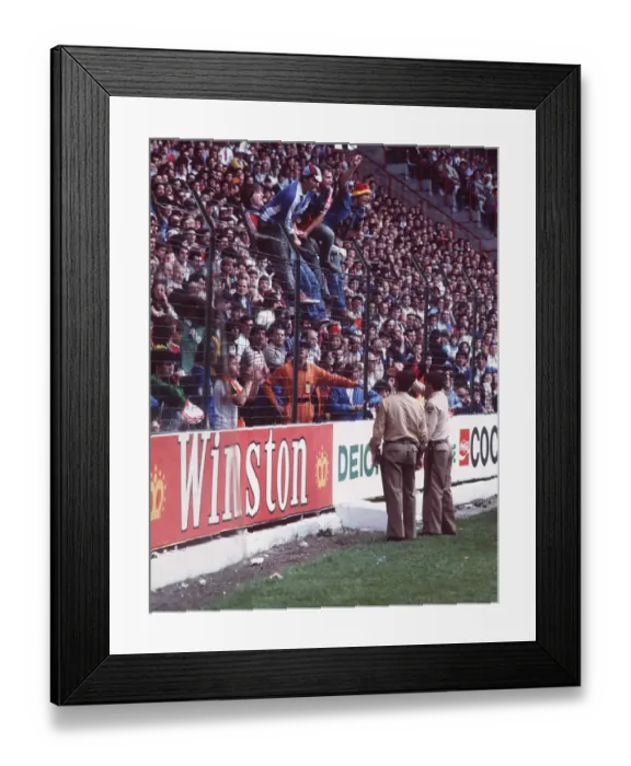 Framed Print : West Germany v Chile fans World Cup 1982 football supporters standing on fence police Framed Print : West Germany v Chile fans World Cup 1982 football supporters standing on fence police