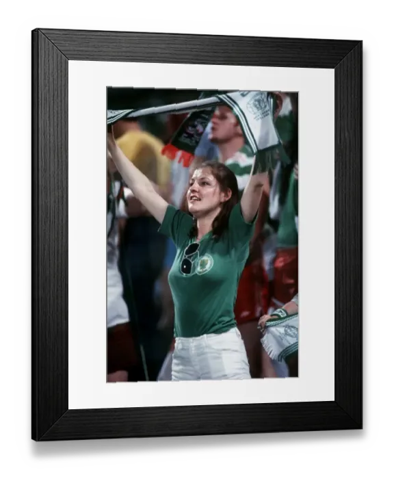 Framed Print : Northern Ireland v Yugoslavia World Cup 1982 football woman supporter with scarf held up