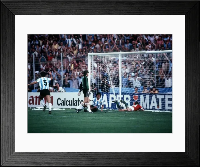 Framed Print : Argentina v Hungary World Cup 1982 football a floored Maradona smiles after