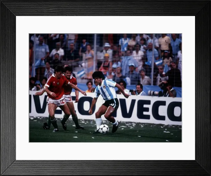 Framed Print : Argentina v Hungary World Cup 1982 football Maradona keeps the ball from Sallai 14