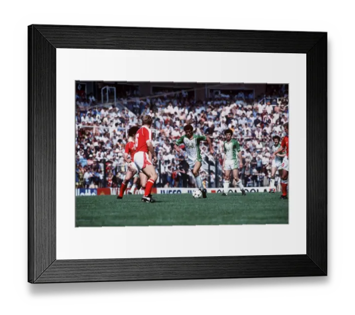Framed Print : Algeria v Austria World Cup 1982 football Salah Assad takes on Bruno Pezzey Framed Print : Algeria v Austria World Cup 1982 football Salah Assad takes on Bruno Pezzey