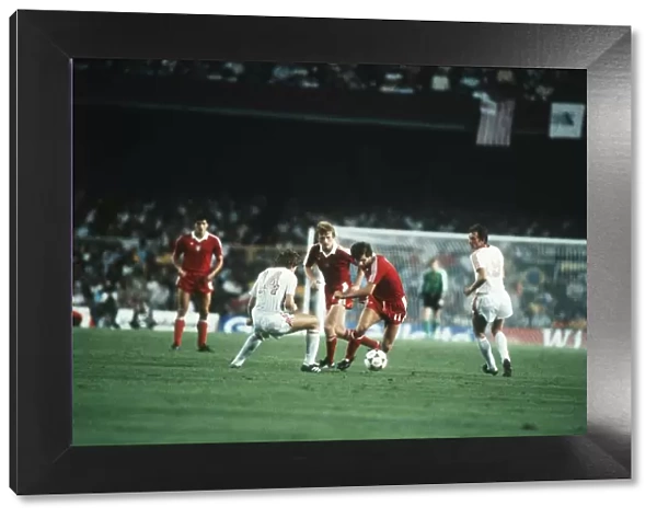Poland v Russia 1982 World Cup Sergei Borovski looks to time his tackle as