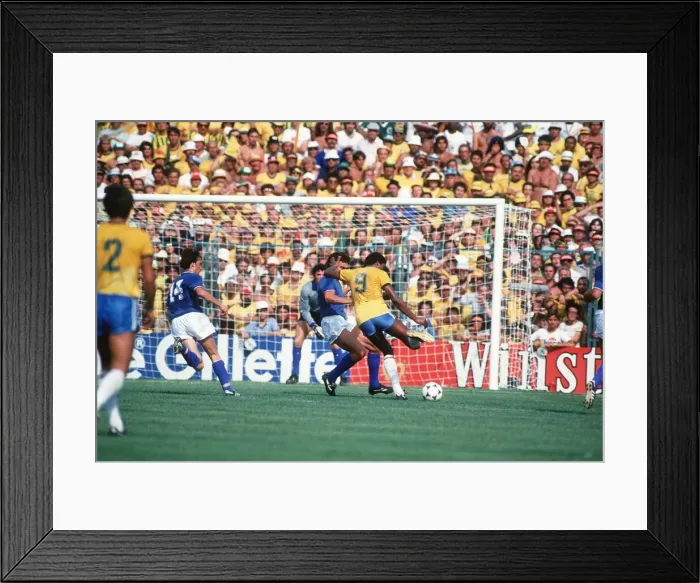 Framed Print : Italy v Brazil 1982 World Cup match Serginho tries a shot at goal Framed Print : Italy v Brazil 1982 World Cup match Serginho tries a shot at goal