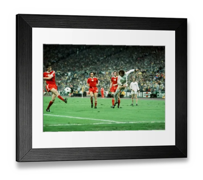Framed Print : West Germany v Poland World Cup 1974 football Overath shooting for goal