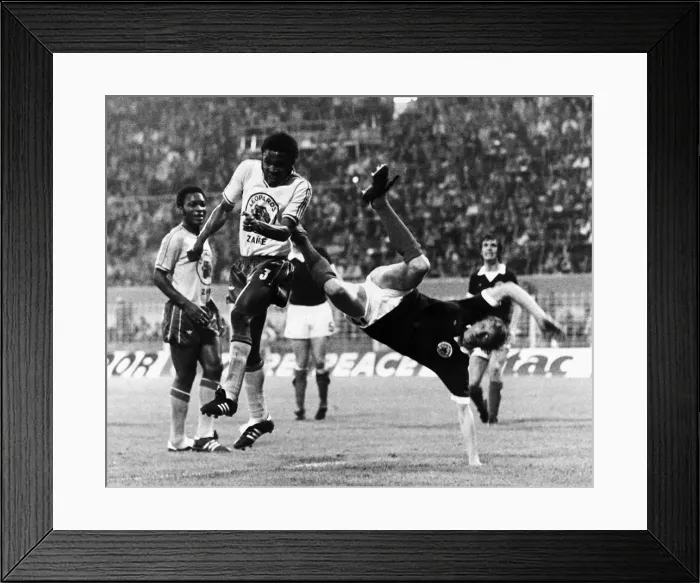 Framed Print : Denis Law in action for Scotland against Zaire 1974 World Cup Framed Print : Denis Law in action for Scotland against Zaire 1974 World Cup