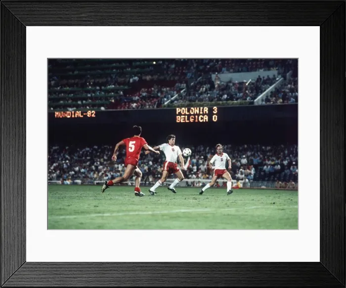 Framed Print : Poland v Belgium 1982 World Cup Michel Renquin tries to make up ground as