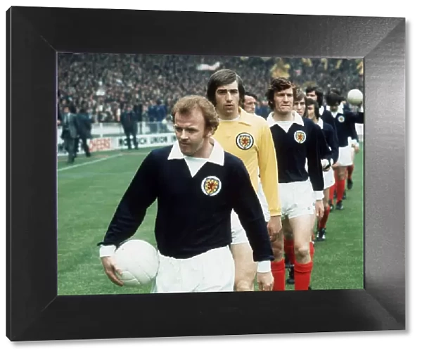 Billy Bremner 1973 Scotland leading out team holding ball