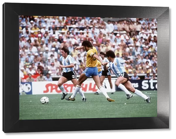 Argentina v Brazil 1982 World cup match Socrates tries to get a foot in