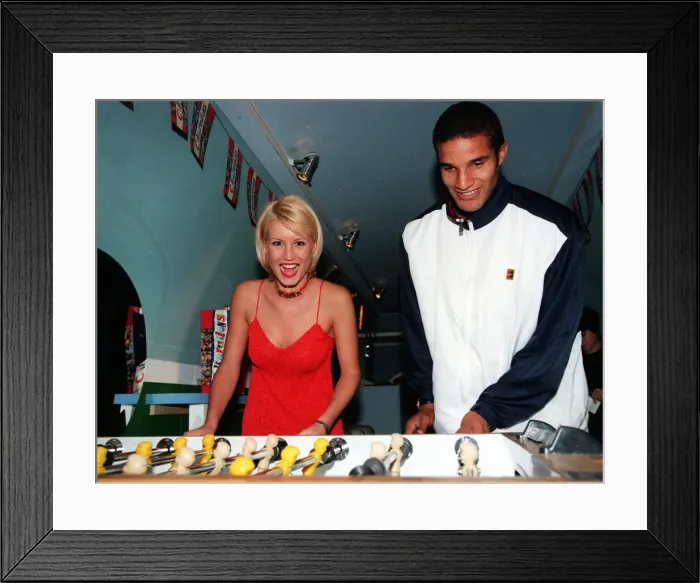 Framed Print : TV Presenter Denise Van Outen with David James of Liverpool Football Club launching new Framed Print : TV Presenter Denise Van Outen with David James of Liverpool Football Club launching new
