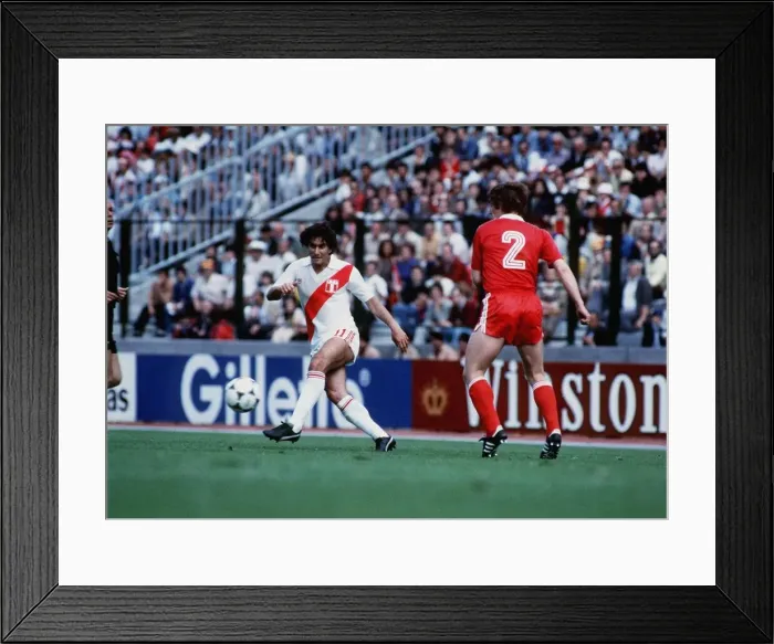 Framed Print : Peru 1 Poland 5 in 1982 World Cup Juan Oblitas of Peru plays the ball away