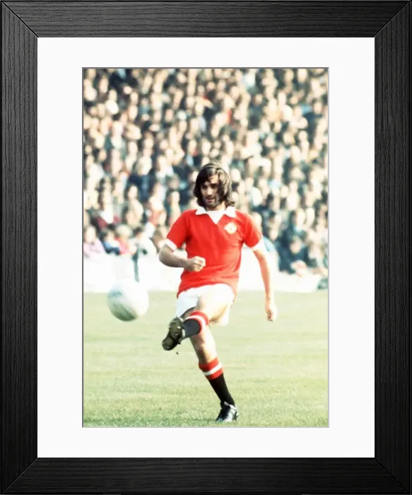 Framed Print : George Best Manchester United Footballer kicking ball 1973 Framed Print : George Best Manchester United Footballer kicking ball 1973