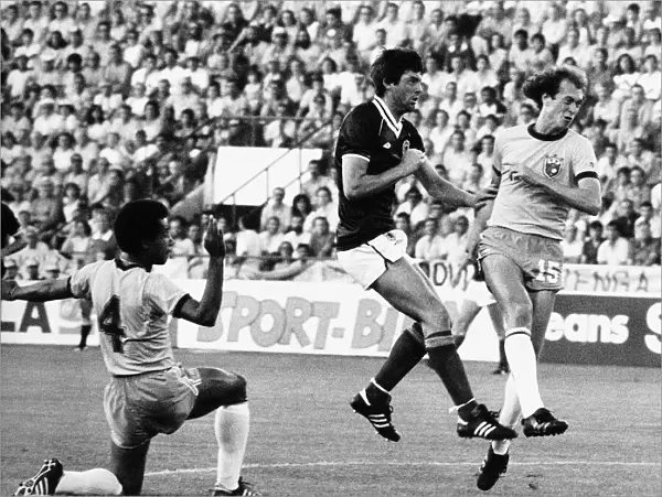 David Narey footballer Scotland scores against Brazil in World Cup 1982 football strip