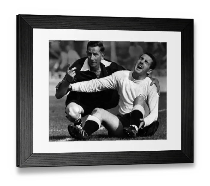 Framed Print : Dave Mackay Spurs football player September 1964 Lie on ground with broken leg Framed Print : Dave Mackay Spurs football player September 1964 Lie on ground with broken leg