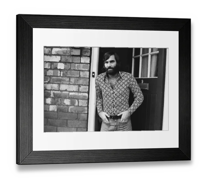 Framed Print : George Best seen here at his Manchester home after rumours that Stoke manager Tony