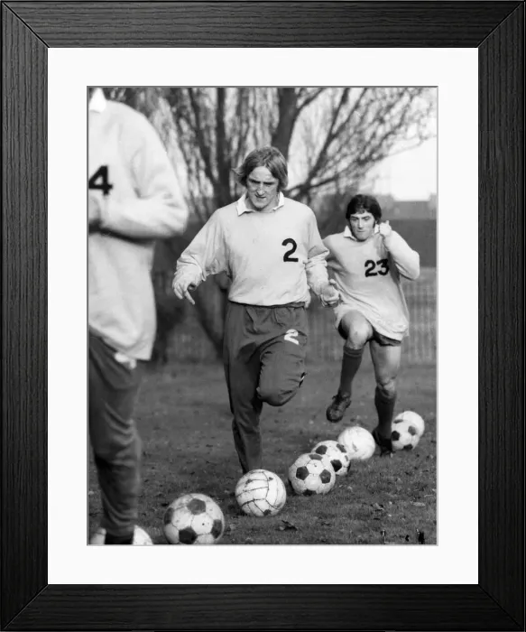 Framed Print : Derek Parkin (centre) Wolverhampton Wanderers full back pictured during training session Framed Print : Derek Parkin (centre) Wolverhampton Wanderers full back pictured during training session
