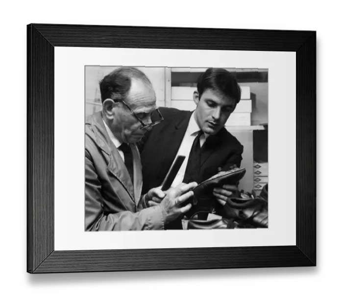 Framed Print : Chelsea forward Bobby Tambling watches as his boots are specially made ahead of the 1967 Framed Print : Chelsea forward Bobby Tambling watches as his boots are specially made ahead of the 1967
