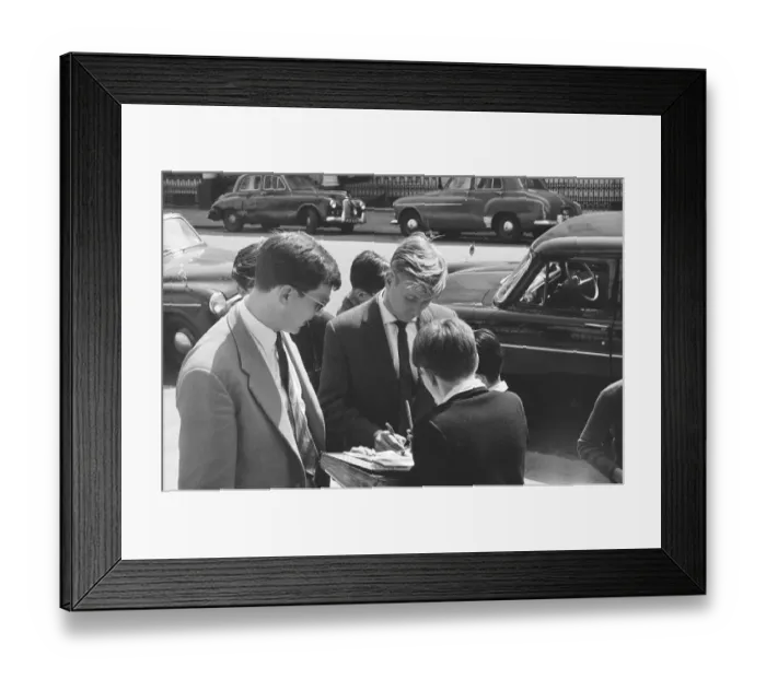 Framed Print : Manchester United footballer Bobby Charlton signs autographs for young fans in Hyde Park Framed Print : Manchester United footballer Bobby Charlton signs autographs for young fans in Hyde Park