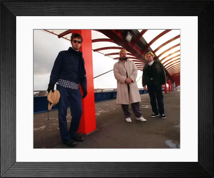 Framed Print : The Eels pop group standing in covered walkway Scottish Exhibition Centre 1997