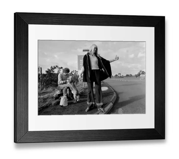 Framed Print : A young couple and their dog trying to hitch a lift on the motorway September 1970 Framed Print : A young couple and their dog trying to hitch a lift on the motorway September 1970