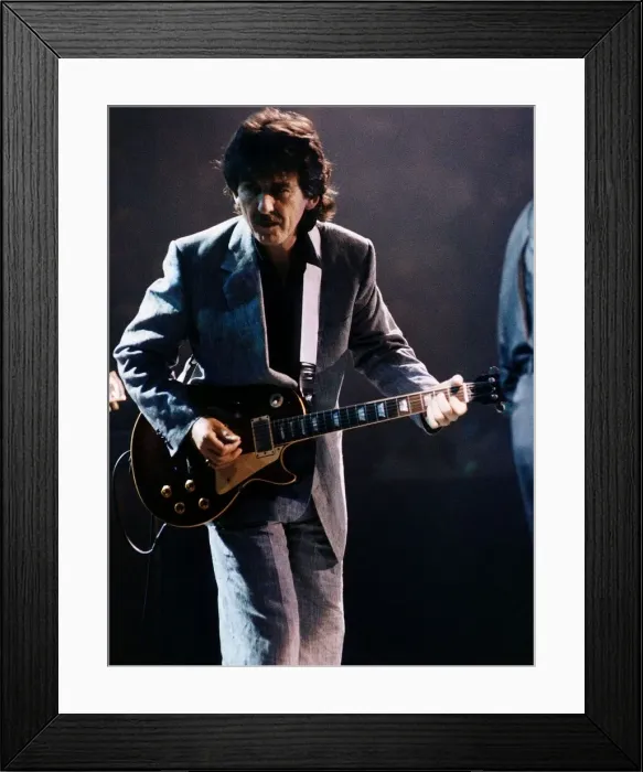 Framed Print : George Harrison on stage playing guitar October 1992 Framed Print : George Harrison on stage playing guitar October 1992