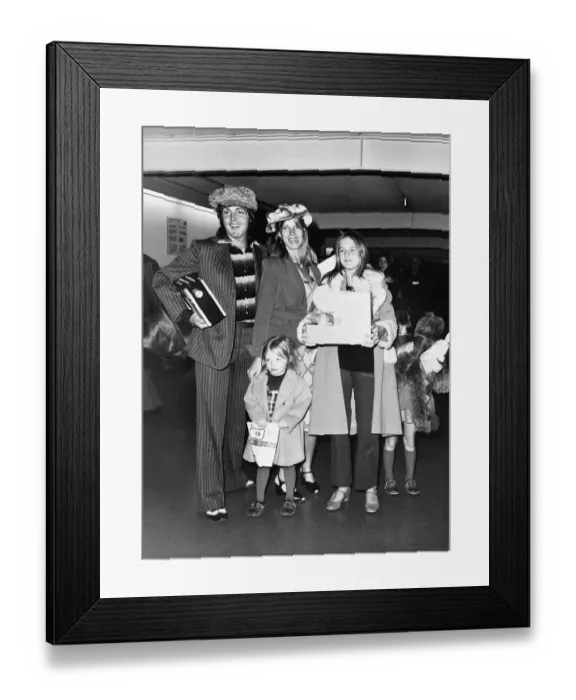 Framed Print : Paul McCartney former Beatles Singer on arrival at Heathrow Airport with his wife Linda