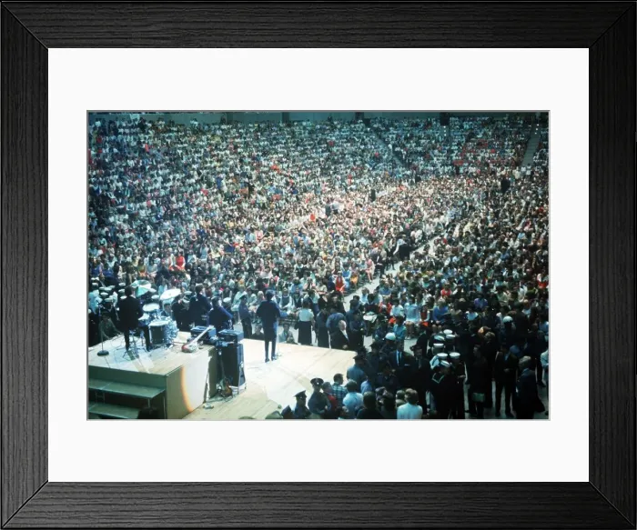 Framed Print : The Beatles play to a packed out Seattle Center during their second tour of the USA