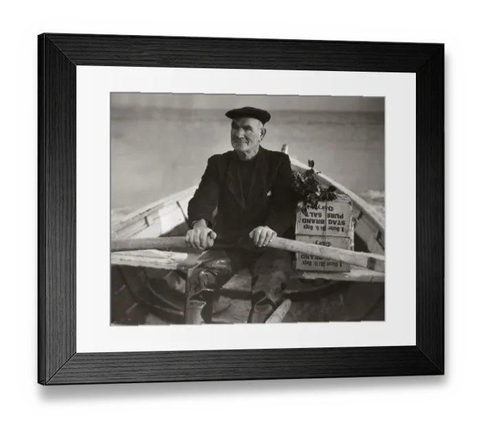 Framed Print : Boatman Old Alick rows the holly-topped Christmas boxes from the families ashore out to Framed Print : Boatman Old Alick rows the holly-topped Christmas boxes from the families ashore out to