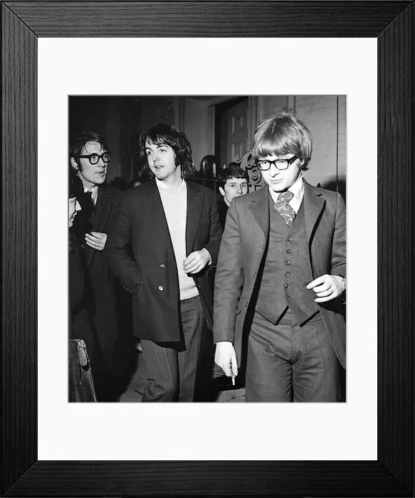 Framed Print : Paul McCartney with Peter Asher leaving Apples offices February 1969