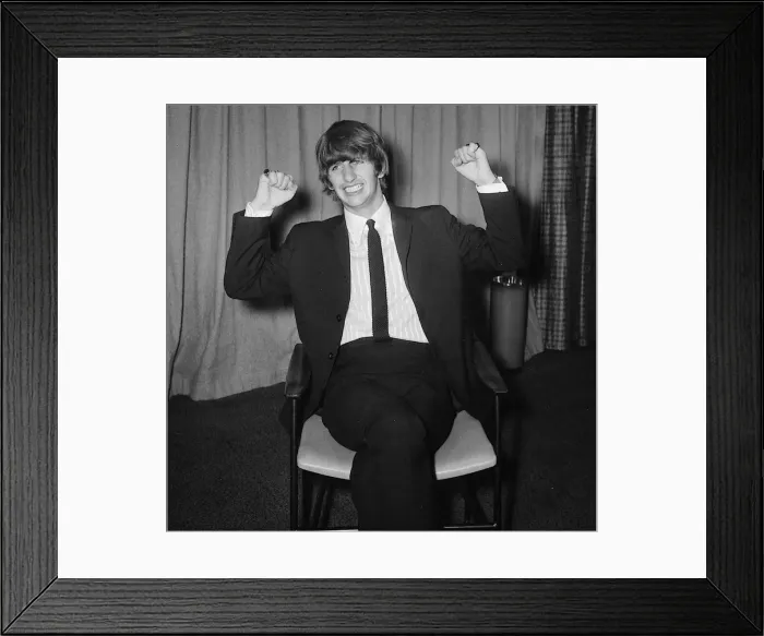 Framed Print : Ringo Starr sitting on chair arms raised February 1964 Framed Print : Ringo Starr sitting on chair arms raised February 1964