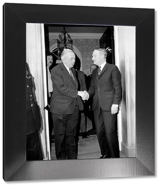 Mr. Harold Wilson saying goodbye to the Irish Prime Minister Liam Cosgrave on the steps