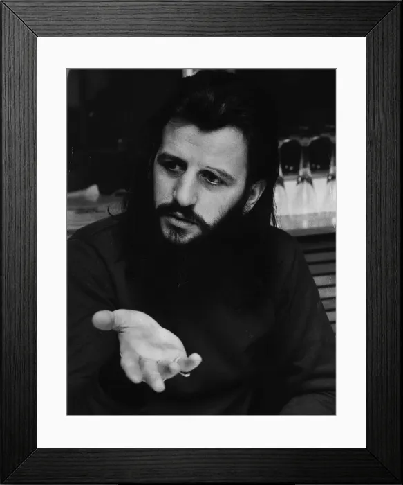 Framed Print : The Beatles drummer Ringo Starr at his office in the Apple Corperation March 1972