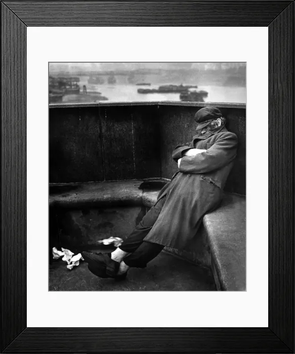 Framed Print : Homeless tramp sleeping rough on Blackfriars Bridge, May 1943 Framed Print : Homeless tramp sleeping rough on Blackfriars Bridge, May 1943