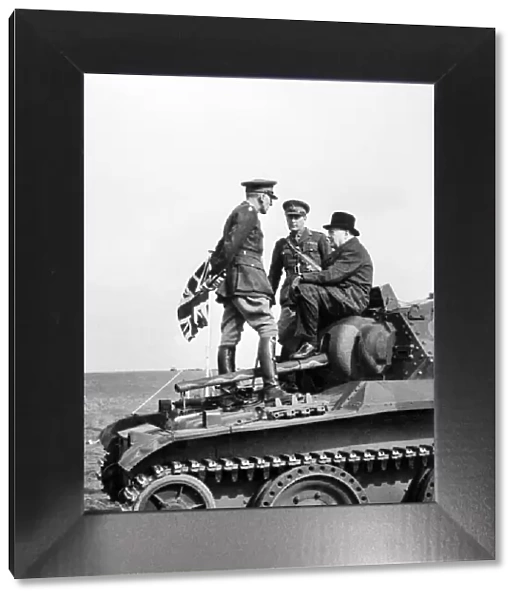 Winston Churchill sitting on a Tank in France, 1944