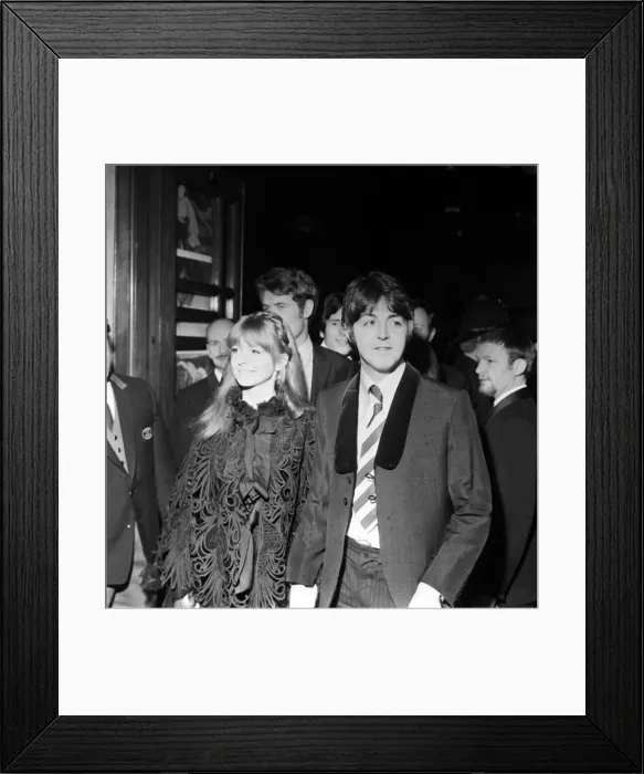 Framed Print : Paul McCartney lead singer with The Beatles at the film Premiere of Round The Mulberry
