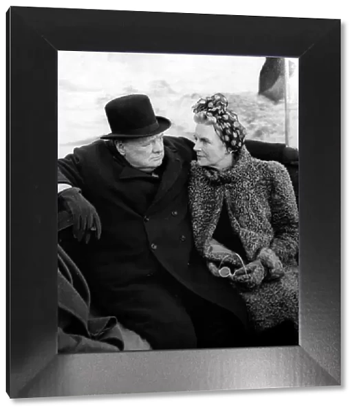 Sir Winston Churchill and wife Clementine seen here returning by boat after an inspection