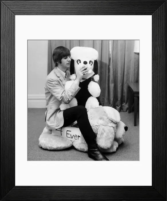 Framed Print : Ringo Starr in his hotel room in New York with one of his most ardent fans during Framed Print : Ringo Starr in his hotel room in New York with one of his most ardent fans during