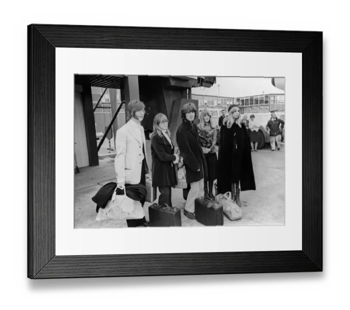 Framed Print : John Lennon with wife Cynthia and George Harrison and his wife Patti Boyd at Heathrow