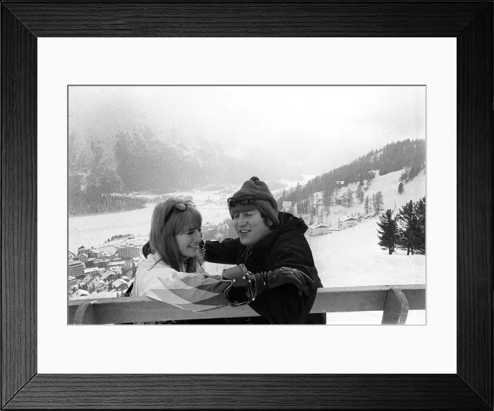 Framed Print : Beatles singer John Lennon with his wife Cynthia on a skiing holiday in St Moritz Framed Print : Beatles singer John Lennon with his wife Cynthia on a skiing holiday in St Moritz