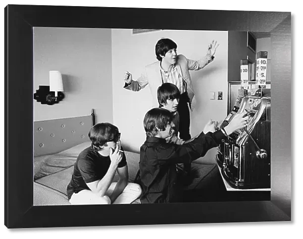 The Beatles with one-armed bandit machine, Sahara Hotel, Las Vegas, 20 August 1964
