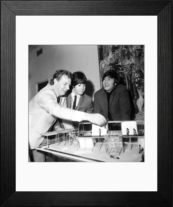Framed Print : Beatles Paul McCartney (centre) and John Lennon are shown the stage set of a new show