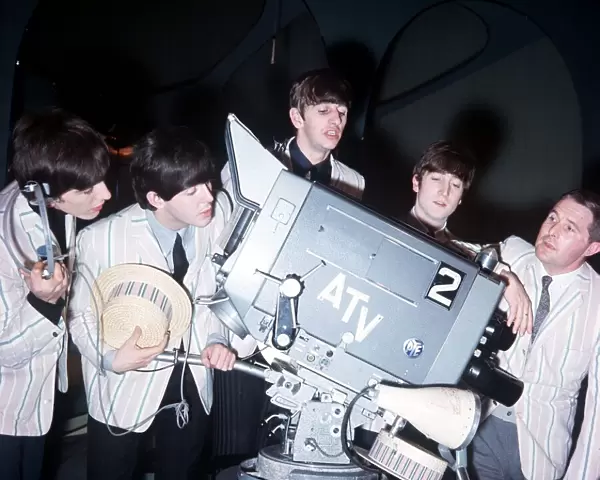 The Beatles pop group rehearse for ATV programme with comedian Ernie Wise (right)