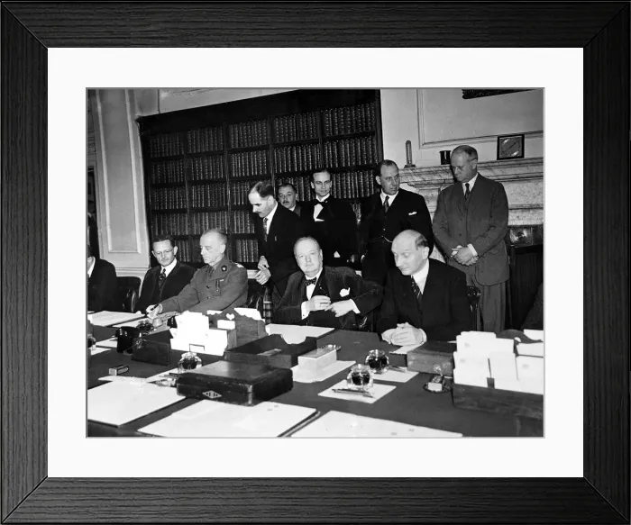 Framed Print : Sir Winston Churchill seen here signing an agreement between Great Britain