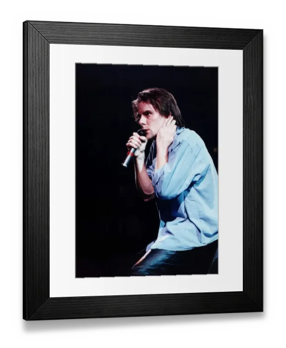Framed Print : Ricky Ross singer rock band pop group Deacon Blue on stage holding microphone May Framed Print : Ricky Ross singer rock band pop group Deacon Blue on stage holding microphone May
