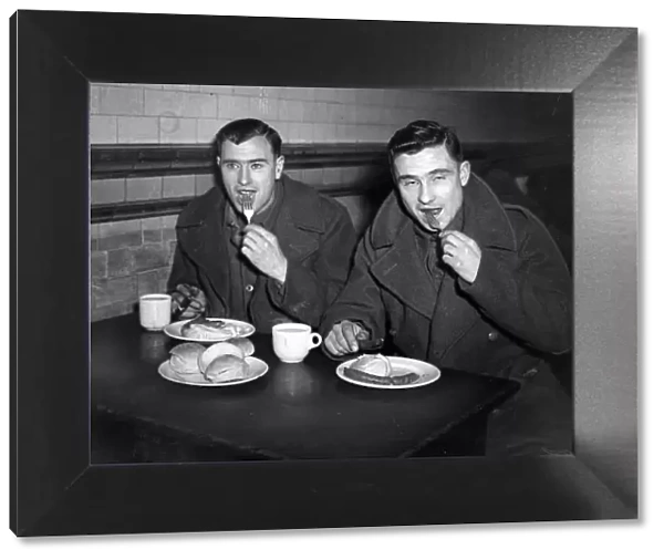 Second World War January 1945 Two soldiers enjoy meal while on leave at Waverley