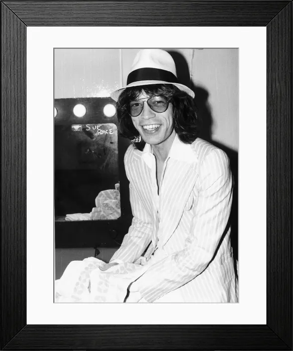 Framed Print : Rolling Stones: Mick Jagger relaxing in his dressing room before a concert May 1976 Framed Print : Rolling Stones: Mick Jagger relaxing in his dressing room before a concert May 1976